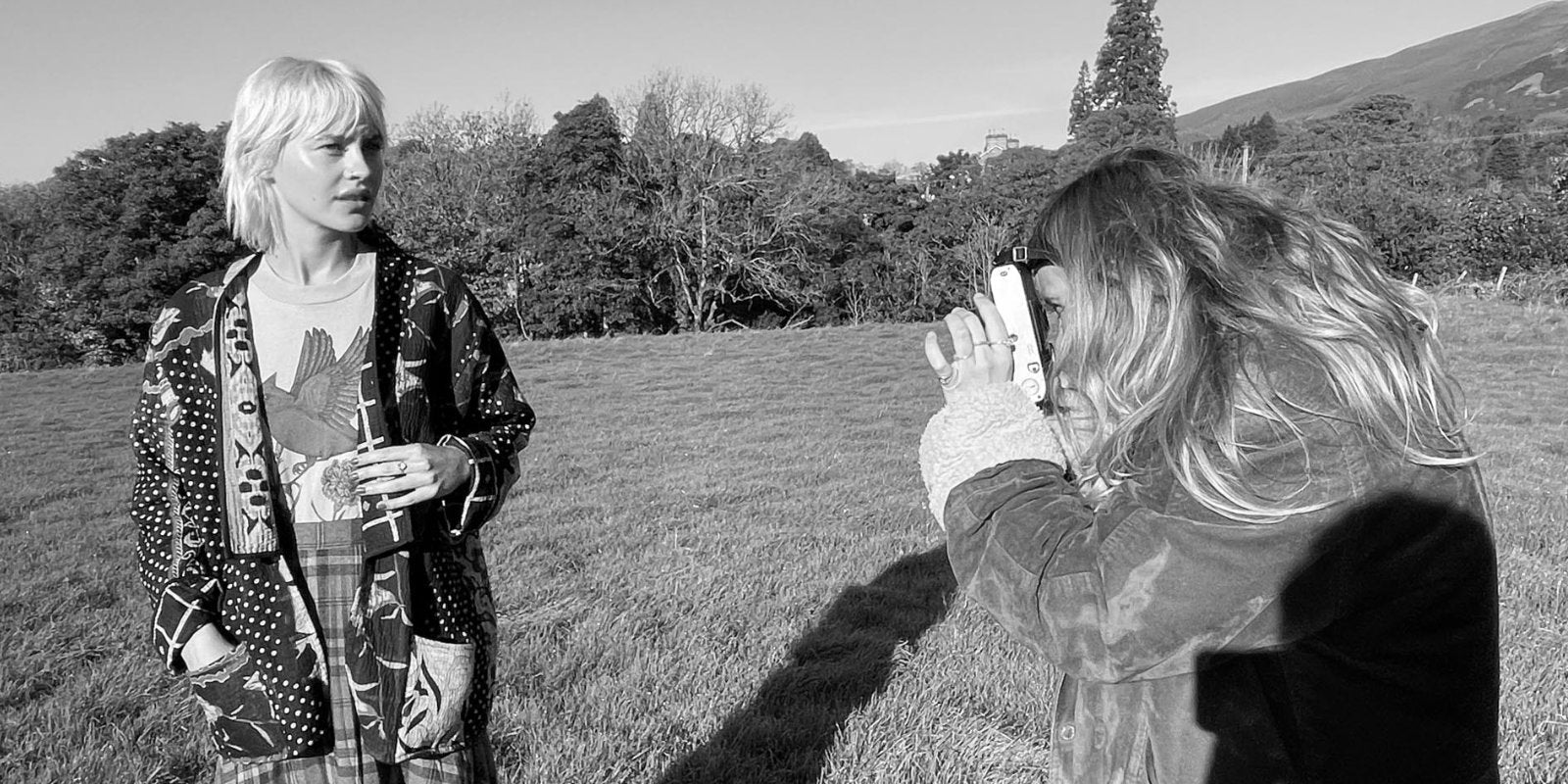 A model is being photographed in a field in Milthrop a tiny hamlet in Sedberg ,the Lake District.