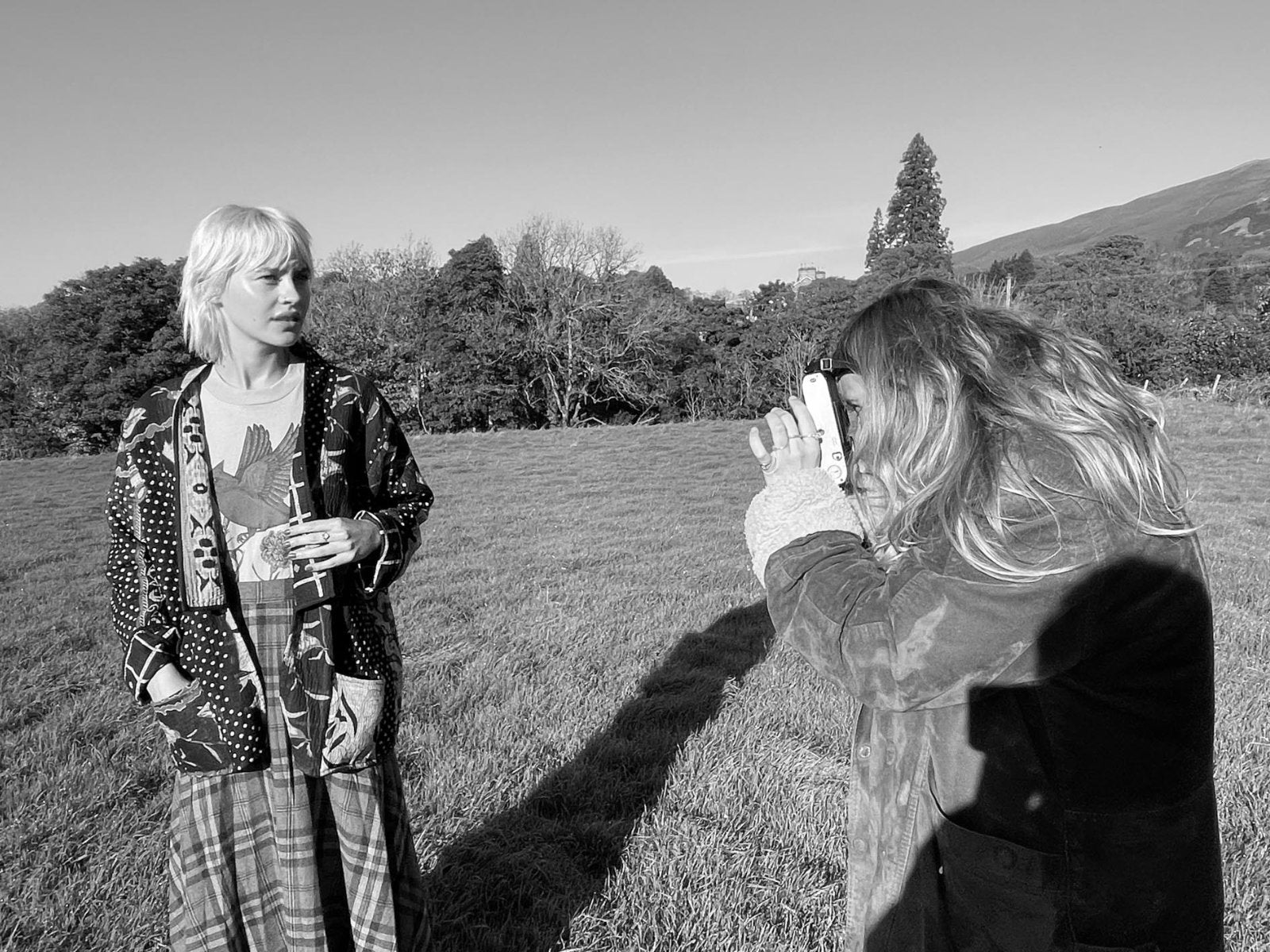 A model is being photographed in a field in Milthrop a tiny hamlet in Sedberg ,the Lake District.